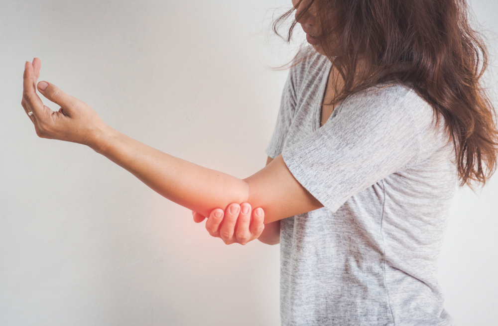 woman elbow pain