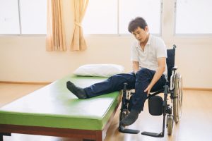 people with disabilities transfer from bed wheelchair