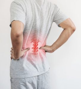 office syndrome backache lower back pain concept man touching his lower back pain point